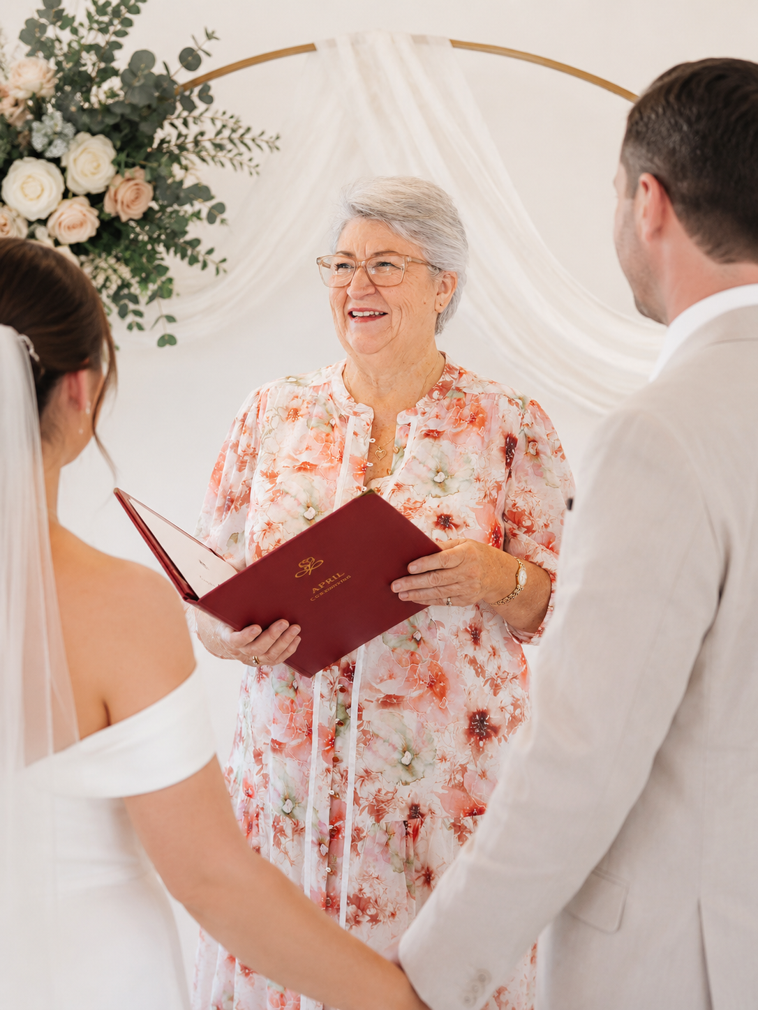 April Daley-Holmes officiating an intimate registry-style ceremony